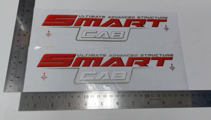 สติ๊กเกอร์ดั้งเดิม-ติดกระจกแค็ป-ด้านนอก-คำว่า-smart-cab-ultimate-advanced-structure-สำหรับรถ-toyota-vigo-smartcab-ปี-2008-2010-sticker-แต่งรถ-ติดรถ-โตโยต้า