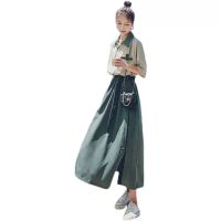 เสื้อผ้าแฟชั่นสำหรับสุภาพสตรี Green dress female in the summer of 2023 the new French temperament design feeling small bump color stitching and ankle long skirt