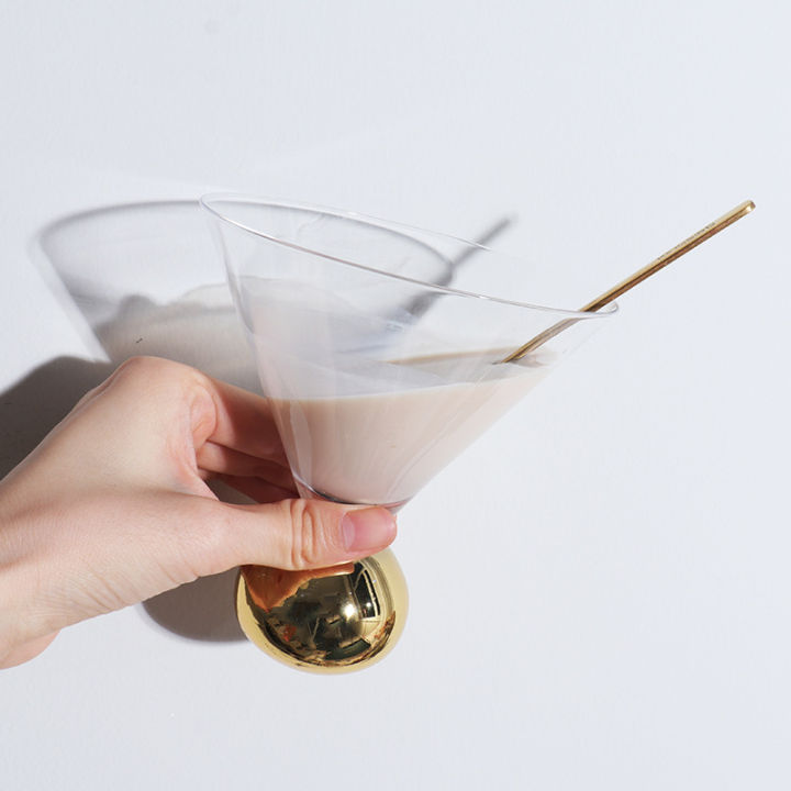 แก้วเหล้าแชมเปญถ้วยค็อกเทลลูกโลกทองคำสวยงามแก้วน้ำดื่มฐานรองบอลมาร์ตินี่