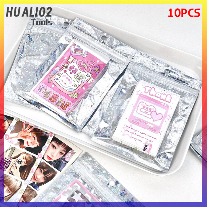 huali02-10ชิ้นบรรจุภัณฑ์เลเซอร์ใสกระเป๋าพร้อมซิปล็อคของขวัญเครื่องประดับกระเป๋าเก็บอาหารถุงบรรจุภัณฑ์ธุรกิจพีวีซี