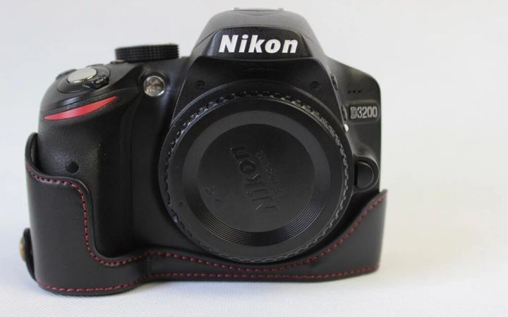 กระเป๋ากล้องวิดีโอหนังแท้แบบใหม่สำหรับ-nikon-d3200-d3100เคสครึ่งตัวหนังแท้ผ้าคลุมรถสีกาแฟสีน้ำตาลดำ