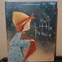 หนังสือนิทานภาพ The Little Prince โดยผู้เขียน Antoine de Saint-Exupery (ในซีล)