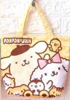 POM POM PURIN กระเป๋า กระเป๋าผ้ามัน นิ่มมือ มีผ้าซับด้านใน หูหิ้ว มีเชือกรูด มัดปากได้ สวยงาม น่าใช้งาน ลายปอม ปอม พูริน   ขนาด34x26X13 cm   BY NPNN SHOP