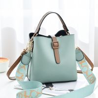 Female bag 2021 new wide shoulder belt bucket bag han edition fashion high-capacity portable bag lady single shoulder bag worn