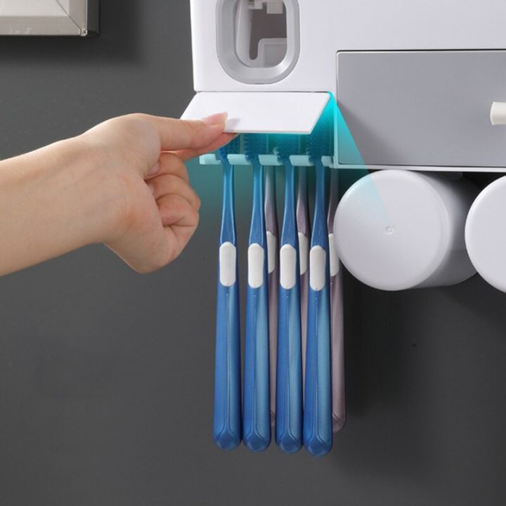ชั้นวางที่บีบยาสีฟันแบบอัตโนมัติแปรงสีฟันติดผนังพร้อมชุดอุปกรณ์ห้องน้ำลิ้นชัก