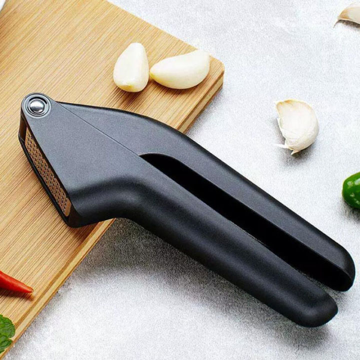 youpin-huohou-kitchen-garlic-presser-manual-garlic-crusher-kitchen-tool-micer-cutter-squeeze-tool-fruit-amp-vegetable