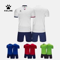 KELME ชุดชุดฟุตบอลแท้สำหรับทั้งหญิงและชายเสื้อเจอร์ซีย์แขนสั้นทีมชุดฝึกซ้อมแข่งขันของนักเรียน