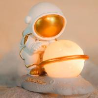 1pcs Astronaut Ornament Yellow Moon Ambient Light Office Decorations Modern Astronaut Resin Desktop Ornaments Modeling Night Lights