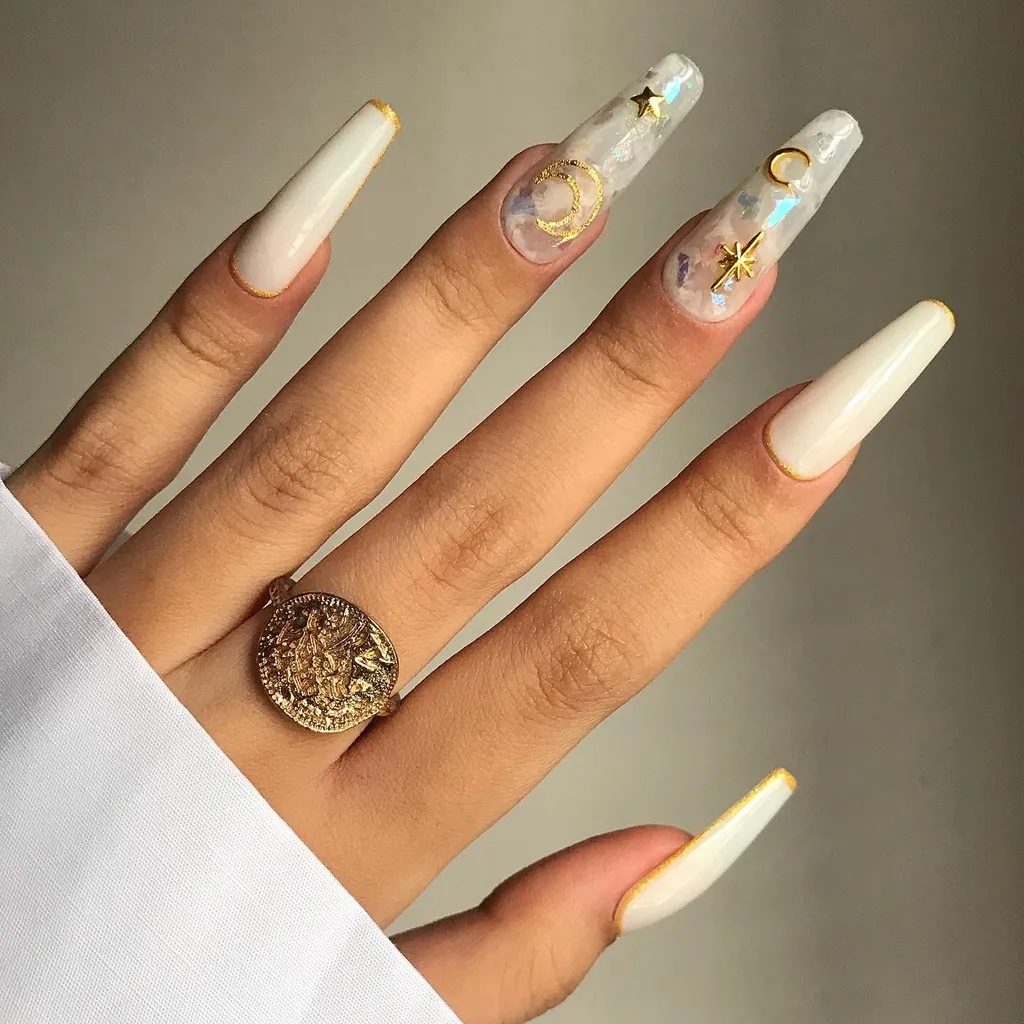 40 Awesome Nail Ideas You Should Try : White Swirl & Gold Flakes