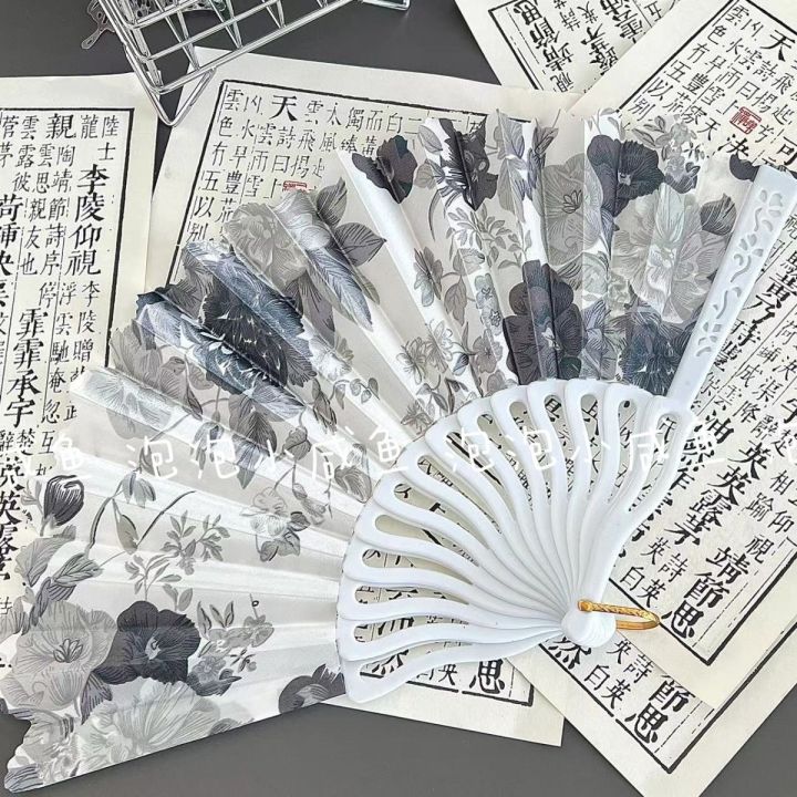 the-new-high-level-folding-fan-dance-appearance-fan-yong-chun-plastic-fans-in-europe-type-folding-fan-fan-han