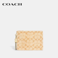 COACH กระเป๋าถือผู้ชายรุ่น Charter Pouch In Signature Shearling สีครีม CC157 UPZ