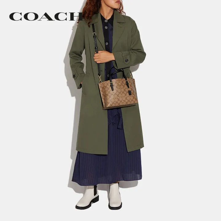 coach-กระเป๋าทรงสี่เหลี่ยมผู้หญิงรุ่น-mollie-tote-25-in-signature-canvas-สีครีม-c4250-imcbi