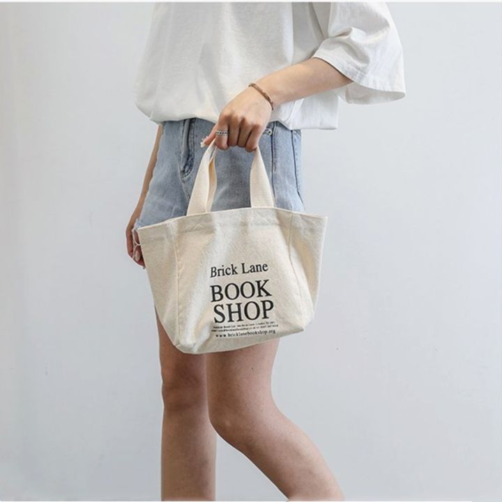 purdored-1-pc-new-women-mini-handbag-korean-style-letters-print-canvas-shopping-bag-for-girl-fresh-small-lunch-bag-tote-bag