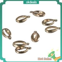 OKDEALS 20pcs ทองเหลืองเบิ้ล เครื่องรางรูปเปลือกหอยทะเล รูปเปลือกหอยทะเล ธีมทะเล เครื่องรางชุบทอง เปลือกหอยรูปสัตว์ทะเลที่มีเสน่ห์ จี้รูปมหาสมุทร เครื่องประดับทำเองจำนวนมาก