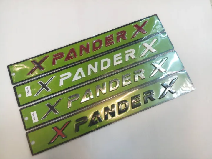 ad-โลโก้-xpanderx-สีขาว-ราคาต่อ1ชิ้น-ไม่ใช่งานจีน