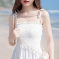 กระโปรงชายหาดสำหรับสุภาพสตรี Summer new Korean version of slim straps one-shoulder dress womens long skirt big swing little black dress beach vacation