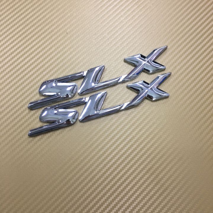 โลโก* SLX สีเงิน ติด ISUZU D-MAX  ขนาด* 2.5 x 16.5 cm  ราคาต่อคู่