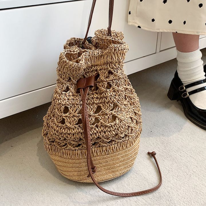 new-hollow-out-straw-bucket-bag-spring-2022-large-capacity-woven-bag-with-drawstring-seaside-on-his-single-shoulder-bag