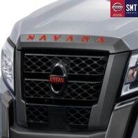 NISSAN NAVARA - โลโก้ฝากระโปรงหน้า (สีส้ม)