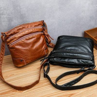 กระเป๋าสำหรับผู้หญิง 2023 แฟชั่นใหม่ร้อยกระเป๋าสะพายหลัง Vintage Soft Leather Net สีแดงไหล่เดียวสุภาพสตรีความจุสูงกระเป๋าแม่