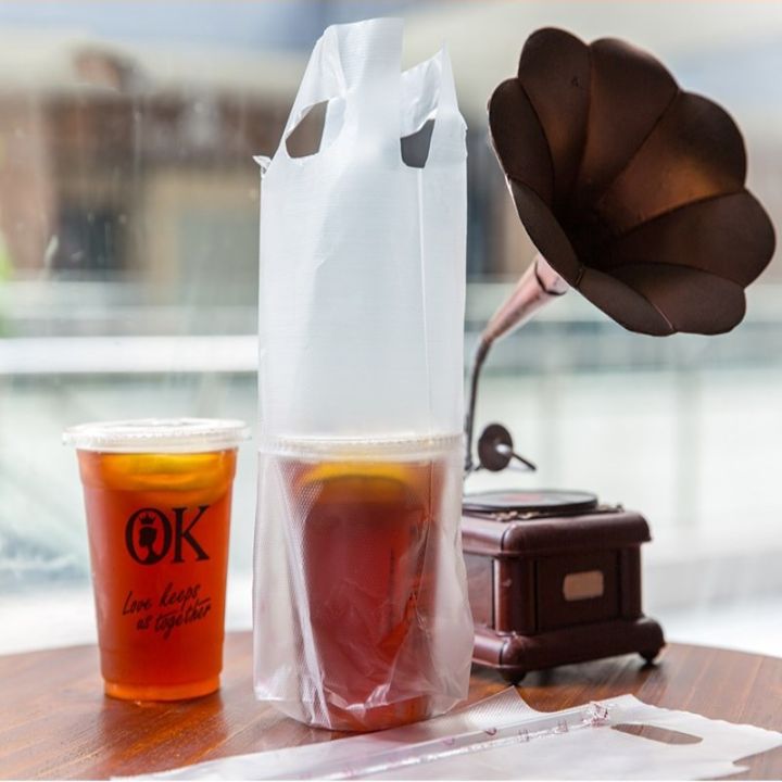 100ถุงชิ้นด้ามจับถุงกาแฟกระเป๋าโปร่งแสงแบบพกพา-สินค้าใหม่มีในสต็อกถุงช้อปปิ้งพลาสติกถ้วยคู่ถุงเครื่องดื่มชา