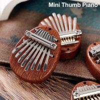 Huankai 1ชิ้น8คีย์มินิเปียโน Kalimba Thumb ไม้ขนาดเล็กสวมใส่ได้จี้รูปอุปกรณ์ดนตรีของขวัญปีอะโนสำหรับเด็กผู้ใหญ่