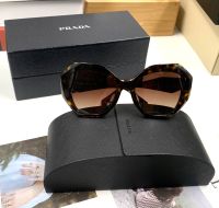 PRADA แว่นตากันแดด รุ่น  SPR 16W-F 2AU6Q1 ( Brown )