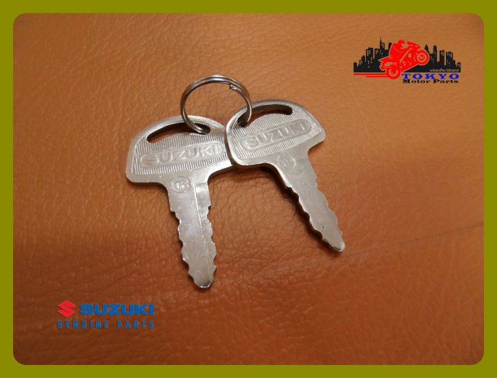 suzuki-ts100-ts125-seat-lock-key-set-sgp-genuine-parts-ชุดกุญแจล็อคเบาะ-ของแท้-รับประกันคุณภาพ