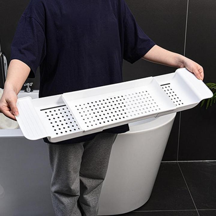 ชั้นเก็บอ่างอาบน้ำแบบยืดหดได้อเนกประสงค์ชั้นวางท่อระบายน้ำอ่างครัวชั้นวางของผ้าเช็ดตัวสำหรับห้องน้ำ