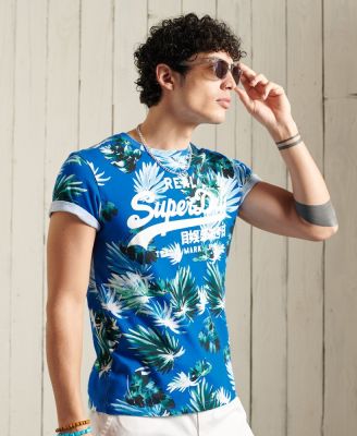 SUPERDRY VINTAGE LOGO AOP T-SHIRT - เสื้อยืด สำหรับผู้ชาย สี Brush Palm Blue