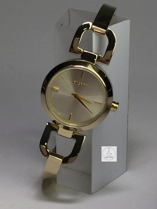 นาฬิกาข้อมือผู้หญิง-dkny-รุ่น-ny8543-ตัวเรือนและสายนาฬิกากึ่งกำไลสีทอง-หน้าปัดสีทอง-รับประกันของแท้-100-เปอร์เซนต์