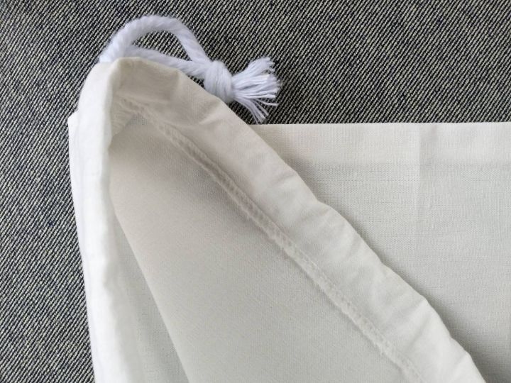 กระเป๋าผ้าดิบสีขาวหูรูด-ขนาด-12x14-นิ้ว