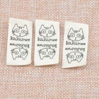 50pcs Beige Woven Labels For Clothing Care Labels Cat Woven Labels Clothing Shoes Bags Washable Garment Tags CP1538 Stickers Labels