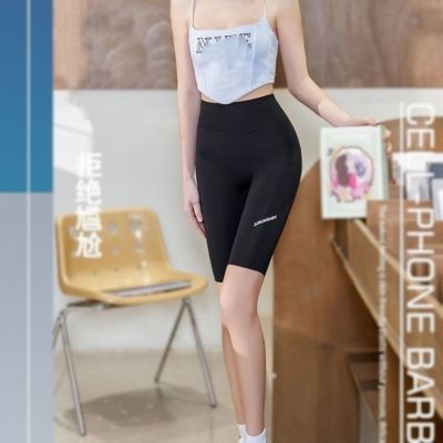 The New Uniqlo summer five-point pocket shark pants letter 5-point mobile phone leggings womens sports tight stretch yoga barbie pants