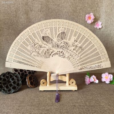 Sandalwood fan hollowed out grass wood fan carving retro craft wood fan national style classical folding fan gift fan