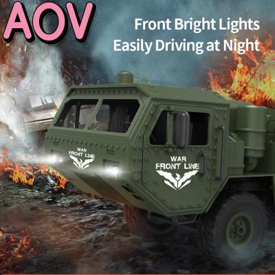 รถกองทัพควบคุมระยะไกล AOV รถบรรทุกขนส่ง RC รถบรรทุกทหาร6WD แบบชาร์จไฟได้2.4GHz รถกองทัพพร้อมไฟหน้ารถบรรทุกขนส่ง RC ไฟฟ้า