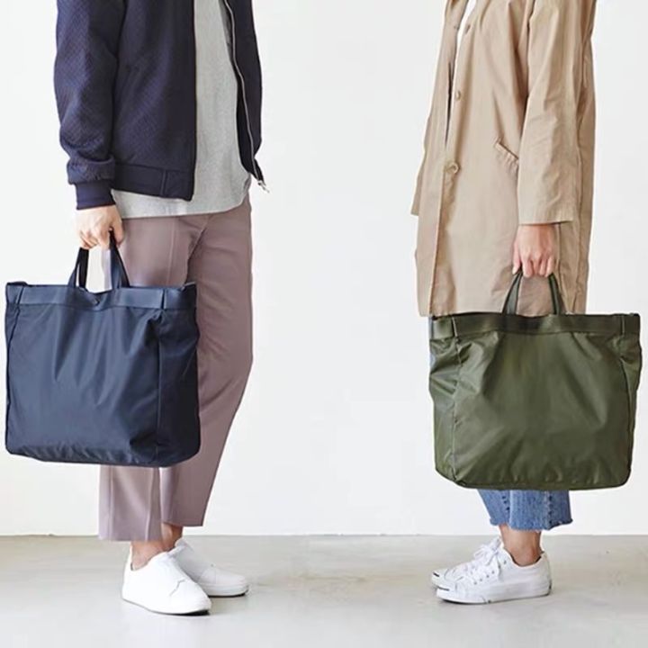 kk57-offer-nylon-travel-handbag-waterproof-portable-clothes-bag-ready-stock