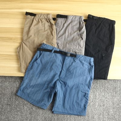 Uniqlo กางเกงขาสั้นผู้ชายแบบแห้งเร็วมีกระเป๋าสามกางเกงขาสามส่วนผลิตแฟชั่นแบบญี่ปุ่นและเกาหลีสีทึบลำลองกีฬา
