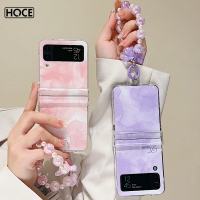 HOCE เคสโทรศัพท์แฟชั่นพิมพ์ลายรอยเปื้อนสำหรับ Samsung Z พลิก4พลิก3 5กรัมพร้อมสร้อยข้อมือมุกคริสตัลบานพับฝาครอบป้องกันเต็มรูปแบบสำหรับ Zflip3เคส Zflip4