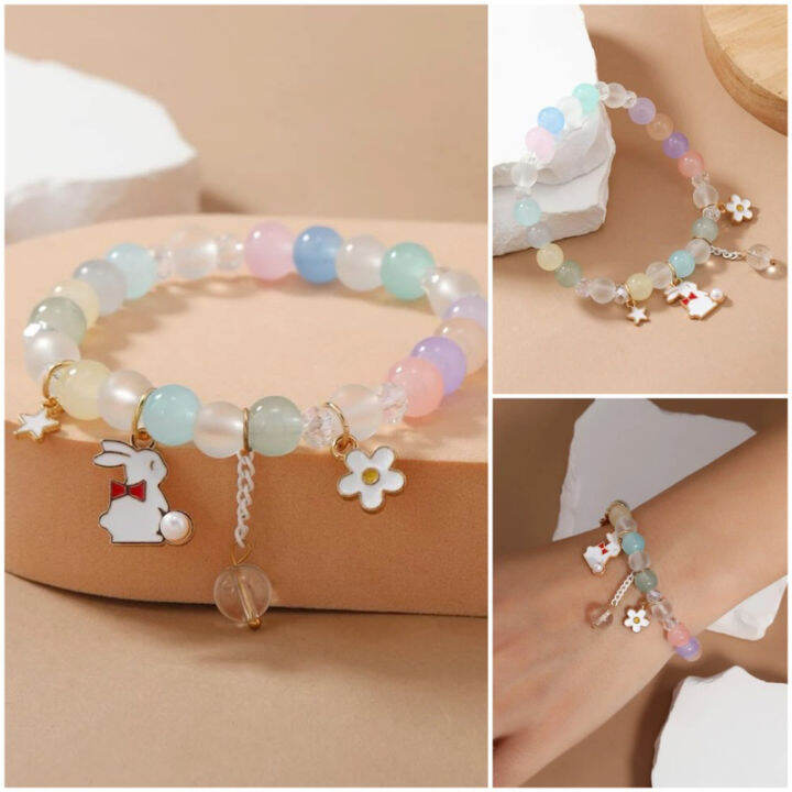 พร้อมส่ง-สร้อยข้อมือลูกปัดกระต่าย-ดอกไม้-และดวงดาว-เอ็นยืดได้