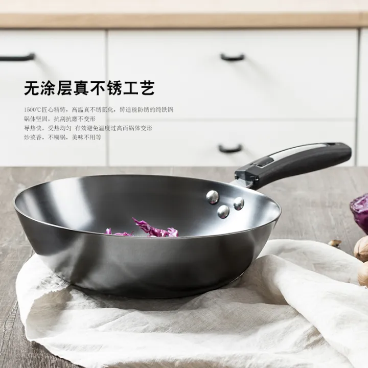Mini wok is really stainless. Small wok is uncoated. Physical nonstick