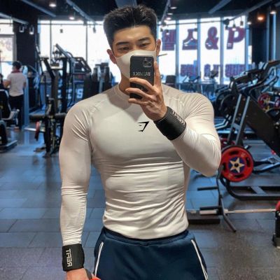 Gymshark ผู้ชายแขนยาวยืดเสื้อผ้าแห้งเร็วกีฬาการฝึกอบรมคอกลม T การบีบอัดแน่น