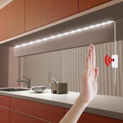 r USB ชาร์จเซนเซอร์แสง ติดบนทุกที่ไฟกลางคืนสำหรับตู้ห้องนอนบันได TV LED Hand Sweep Motion Sensor LED Strips 5V USB LED Light Strip Backlight Kitchen Closet Ruban Tape 1m 2m 3m 4m 5m