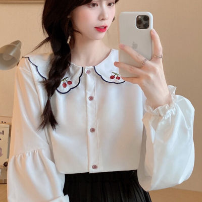 เสื้อผู้หญิงปักลายกลีบดอกเชอร์รี่ปกตุ๊กตาเสื้อผู้หญิงสีขาวเสื้อเชิ้ตสไตล์เกาหลีหลวม