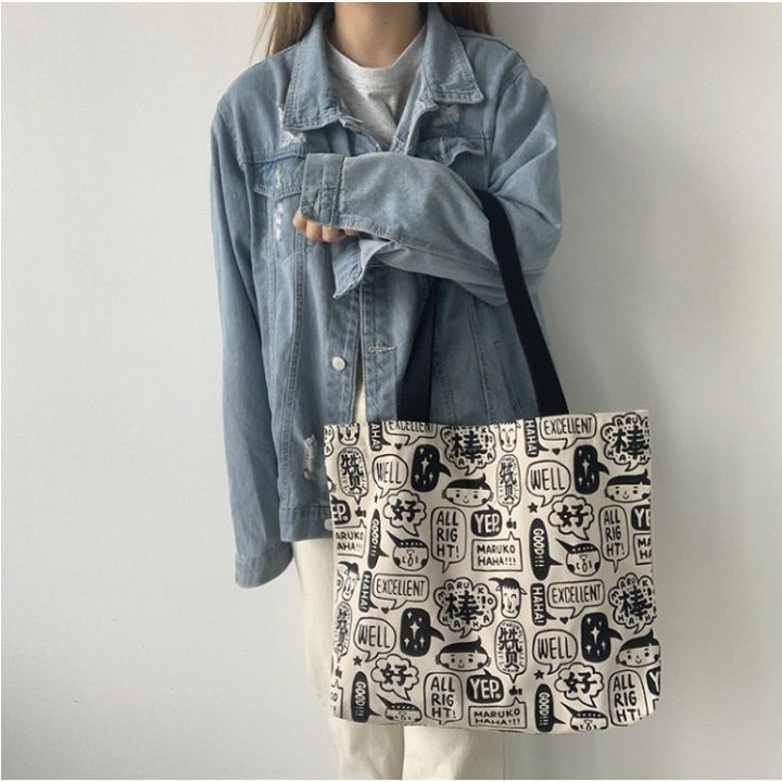 homemart-shop-กระเป๋าผ้าลายการ์ตูนอักษร-แนววิเทจ-กระเป๋าถือ-กระเป๋าผู้ชายผู้หญิง-bag017