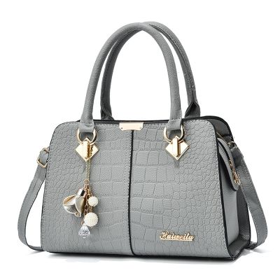 Middle-aged female bag 2021 han edition contracted the new fashion lady handbags mother bag shoulder inclined shoulder bag