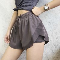 Big yards exposed female loose shorts prevention high speed dry running fitness pants waist false two yoga pants in the summer