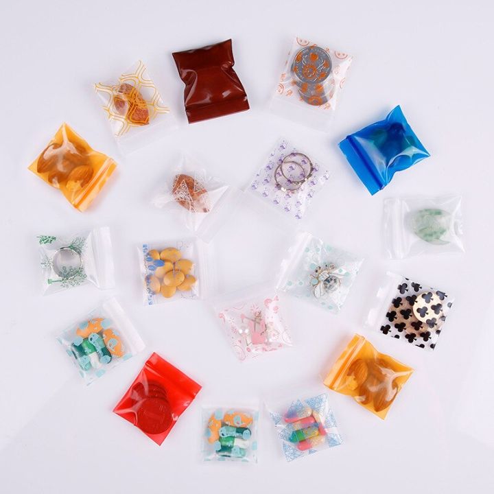 100pcs-4x5cm-mini-ziplock-bag-transparent-plastic-jewelry-packaging-pouches-cute-mini-printed-zipper-bags-storage-supplies-food-storage-dispensers