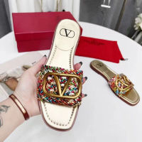 2023 new ValentinoˉV-buckle weaving slippers flat sandals womens summer outdoor wear all-match super hot leather beach shoes