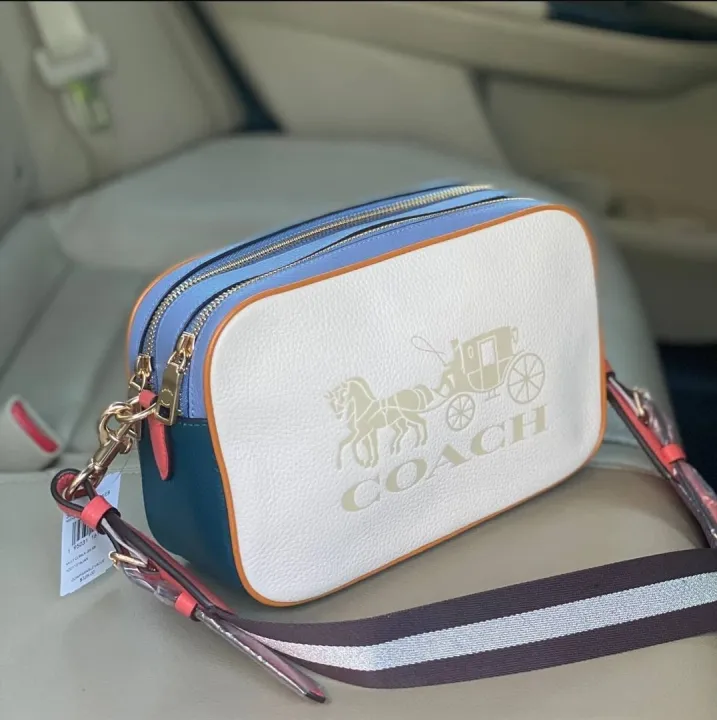 peacock coach bag